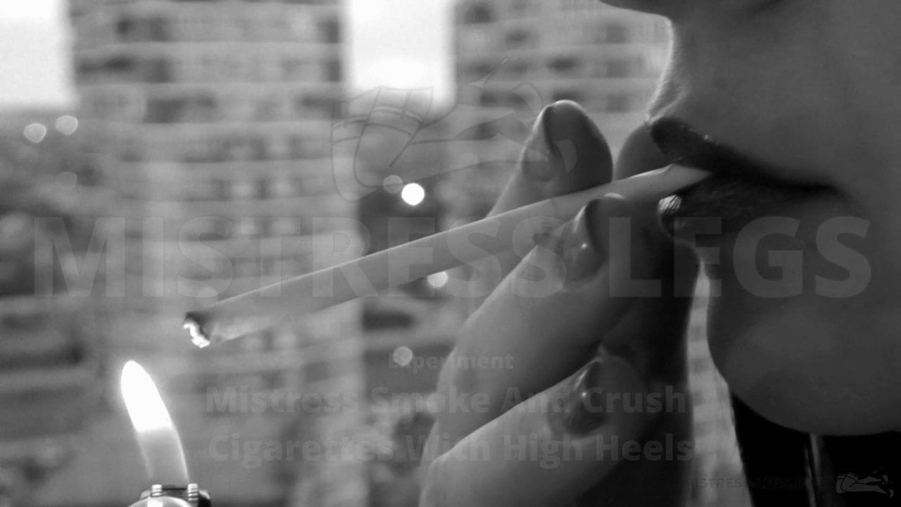 Mistress is smoke and crush cigarette