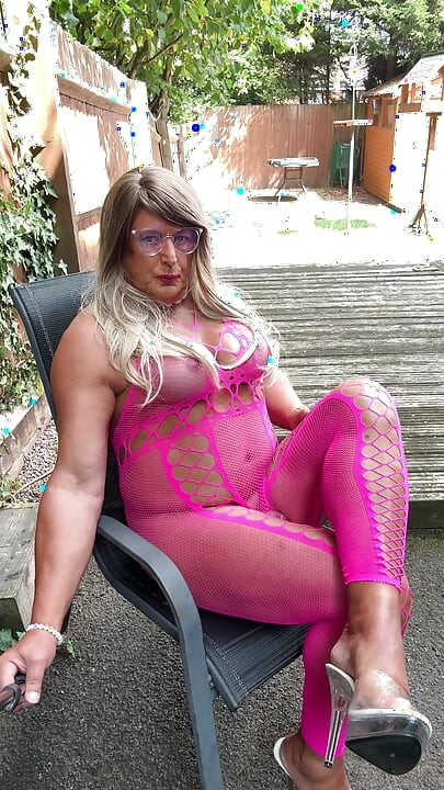 Sexy Crossdresser Kellycd2022's in pink fishnet catsuit and heels