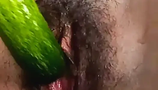 Teen college girl masterbating using cucumber