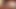 Closeup dildo masturbation in reversed video
