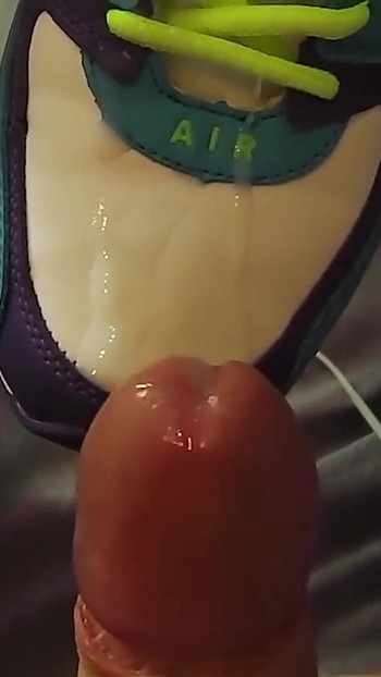 Stunning moment from "Fuck with Her Sneakers - Footjob in Nikes"