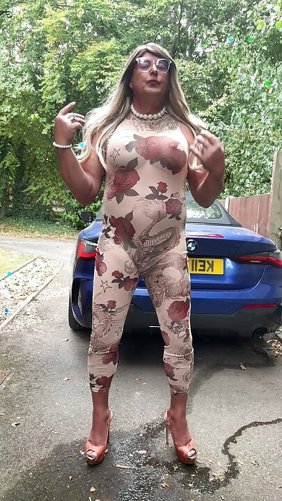 Sexy Crossdresser kellycd2022 in sexy floral see thru catsuit and heels