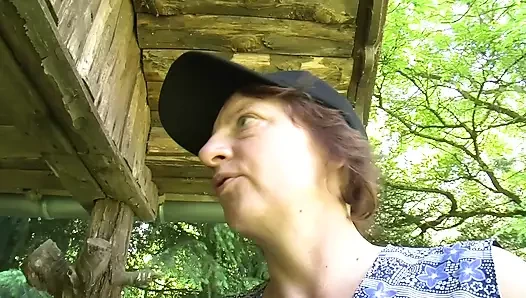 Slimy fuck with Helga 57 in the garden and the neighbors watch curiously