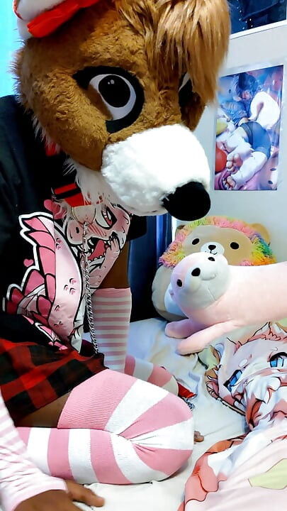 Sissy femboy slut in fursuit shows you his tight ass and chastity cage