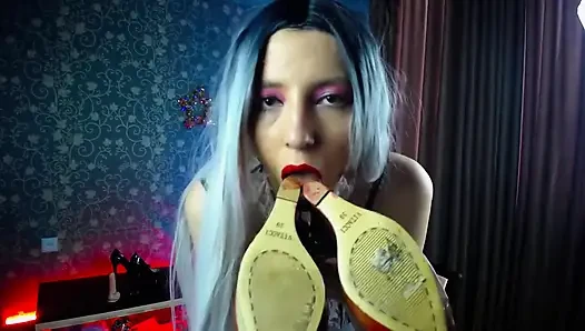 Feet in heels and licking heels