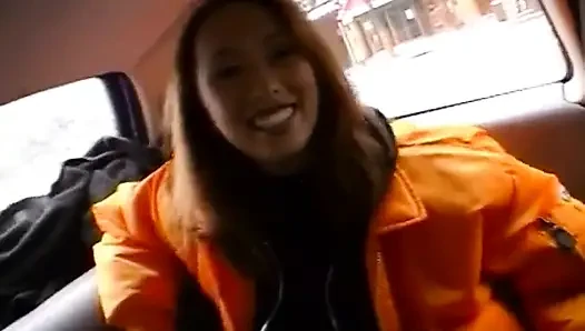 Asian chick gets spitroasted in the back seat of the car