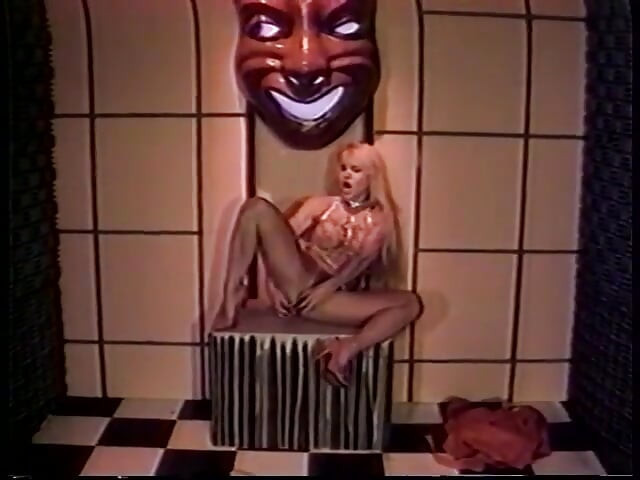 Blondie gets horny and fucks her holes with two dildos
