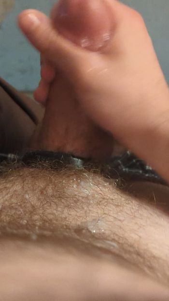 Jerking off at home by myself and edging my fat American cock until I start gushing precum into a long extended orgasm and I shoot my load