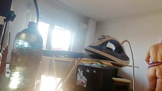 Amateur wife doing housework naked. Sexy and naughty wife trying on clothes that she cuts.