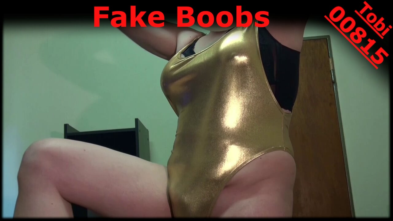 Fake Boobs - some posing in shiny gold swimsuit, shaved body