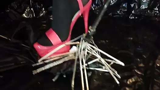 Lady L crush umbrella with sexy red high heels.
