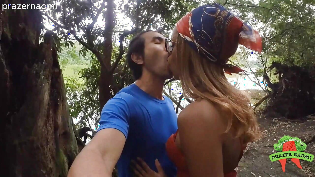 Black slut having sex in the park with an Asian guy
