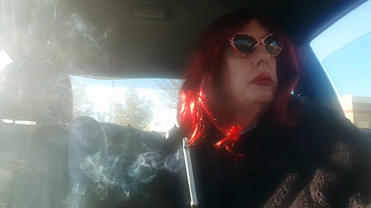 MATURE CD TS SISSIE CAR SMOKING A VS120, THEN A MORE120