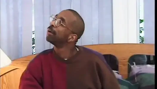 Black guy gets his cock sucked by white redheaded milf in the bedroom and fucks her.