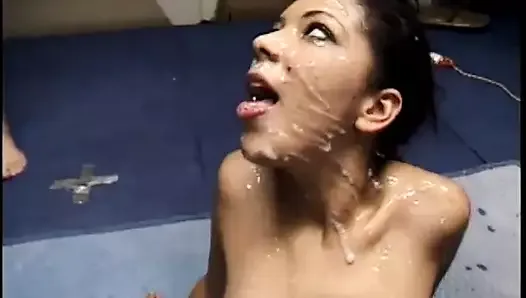Dirty talking slut loves her bukkake cum bath