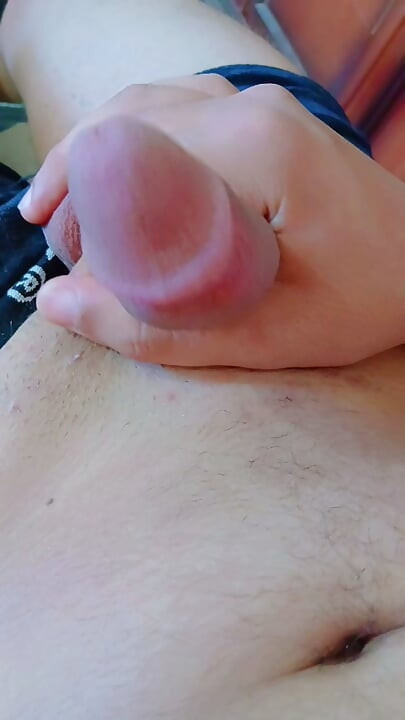 Playing with the penis and licking it