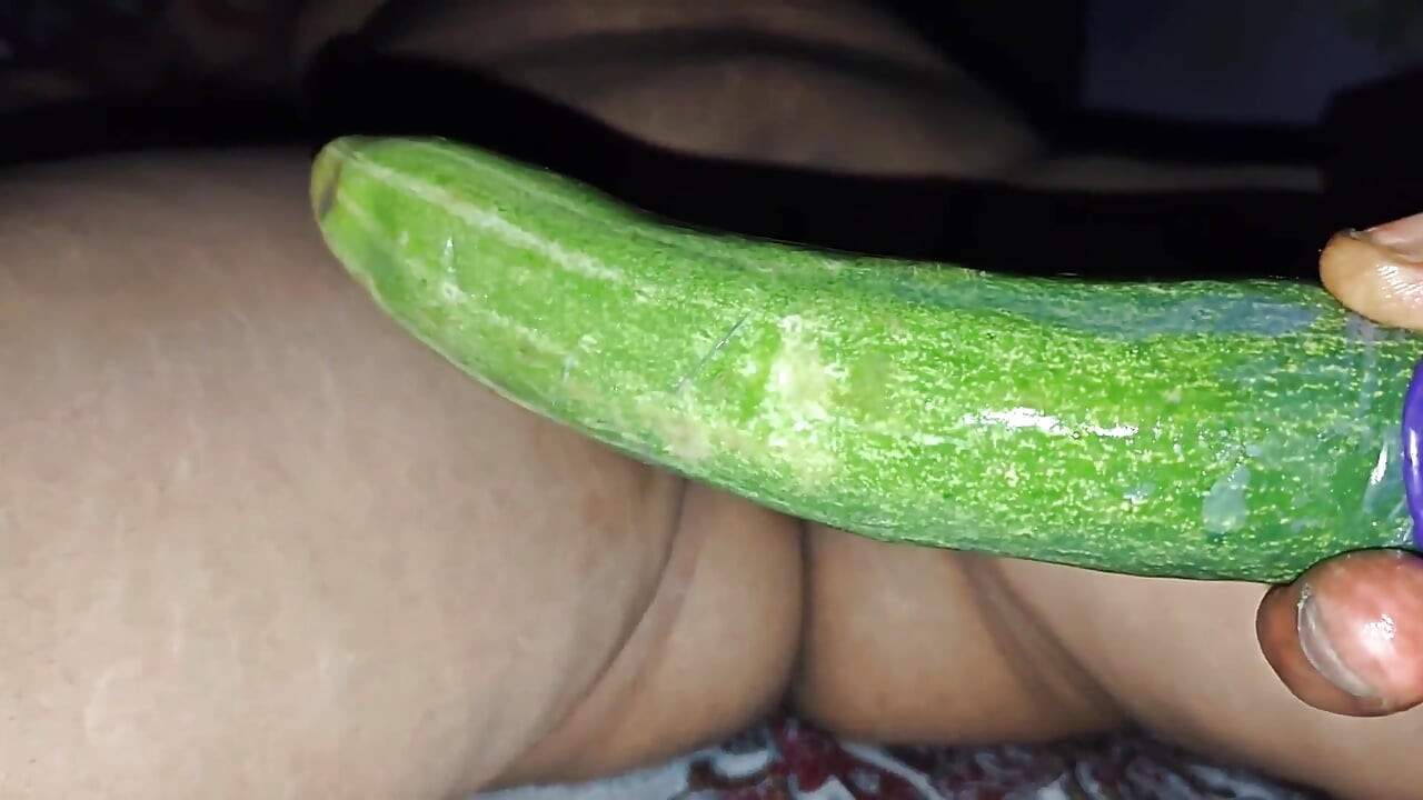 A Long, Thick Cucumber in a Hot Desi Bhabhi's Hot Pussy
