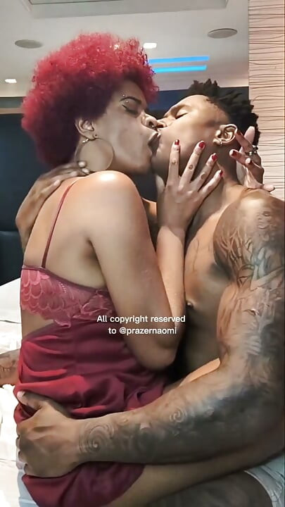 Kissing intensely, with spit and lots of drool
