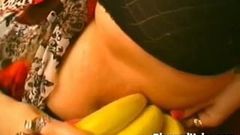 MILF with huge titties fucking a banana