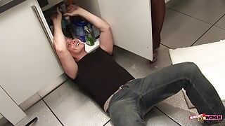 Horny brunette pounces on her handsome plumber and sucks his large cock