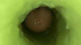 Cummin in slow motion inside a long melon