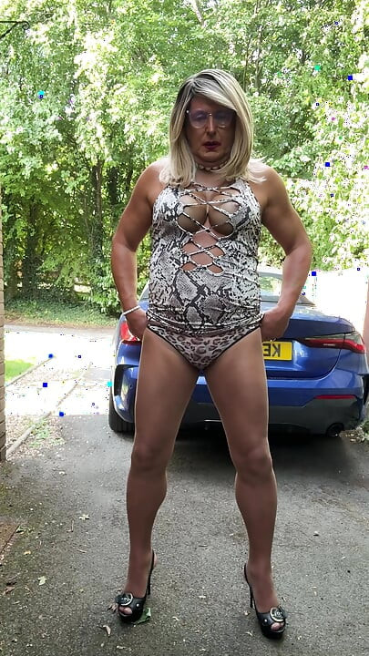 Sexy Crossdresser kellycd2022 in white animal print dress pantyhose and heels