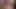 Orta yaşlı seksi kadın kamerada tıraşlı amcıkla oynarken bacaklarını açıyor