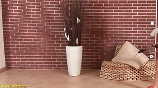 Hot sporty milf plays with her oiled boobs