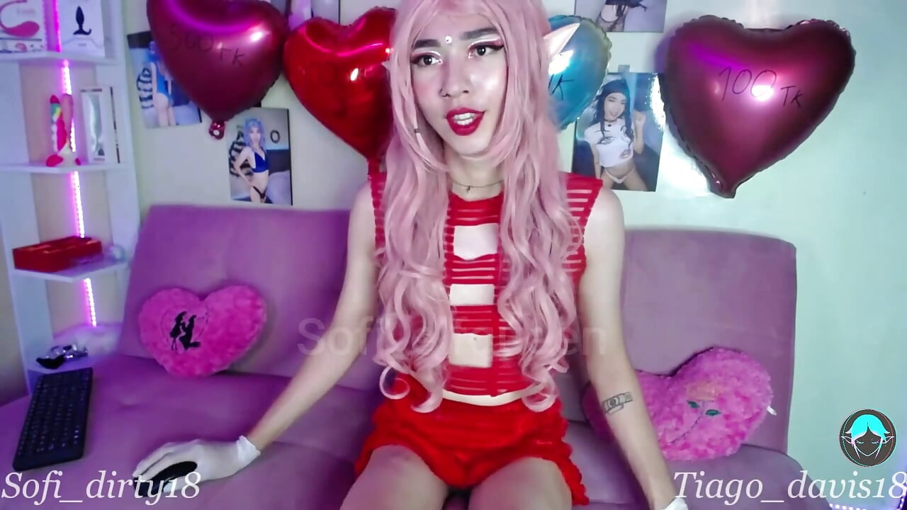 乳胶服显示性感精灵玩手套