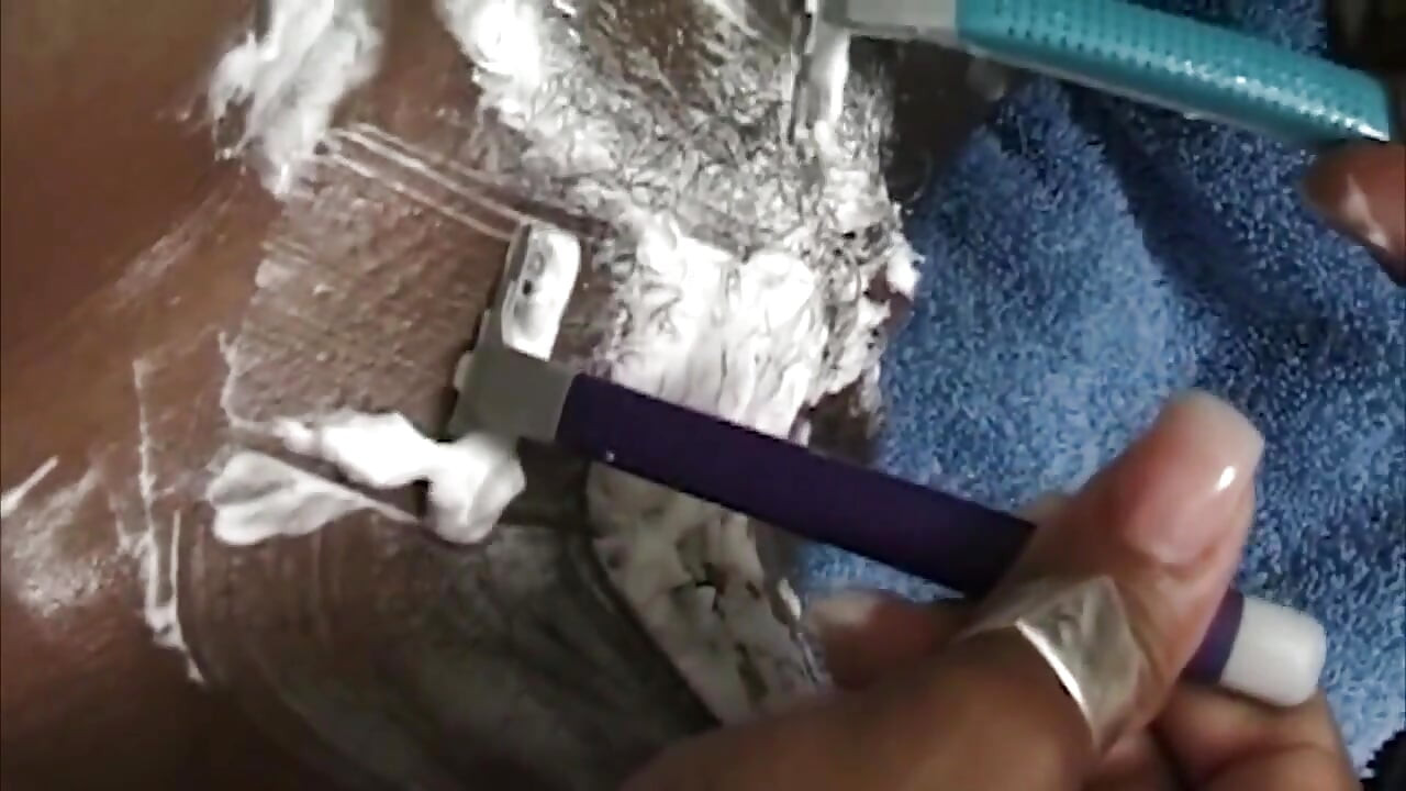 Curly MILF Gets Shaved Smooth Before Massive Facial