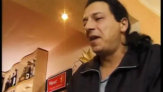 Brunette milf in a bar banged in a double penetration by the waiter and a customer