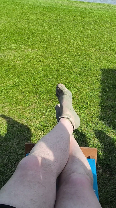 Barefoot Waiting for the Tide on the Beach