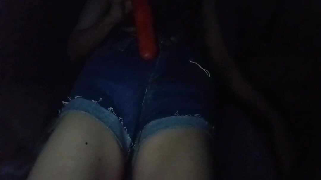 Stroking myself in denim shorts with my first toy