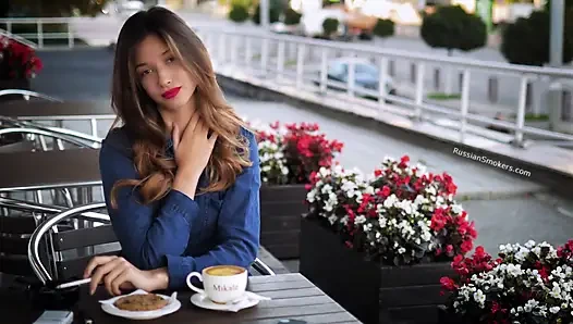 Magnetic Russian Beauty Playing with Cigarette Smoke
