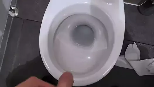Male peeing in the public toilets during work time