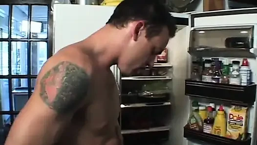 Young sexy couple love in the kitchen