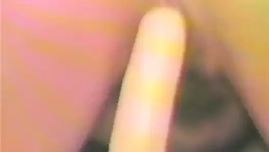 Older brunette fucks both her holes with dildos