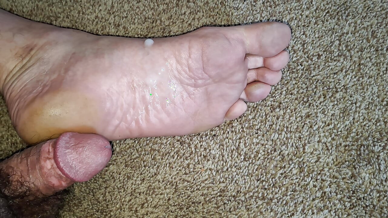 Sitting on the floor stroking my cock and cumming on my bare foot