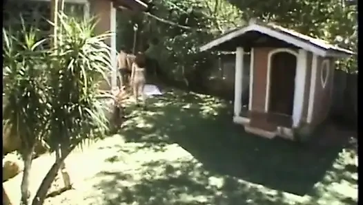 Bisexual threesome with stunning brunette and two hot studs fucking outdoors