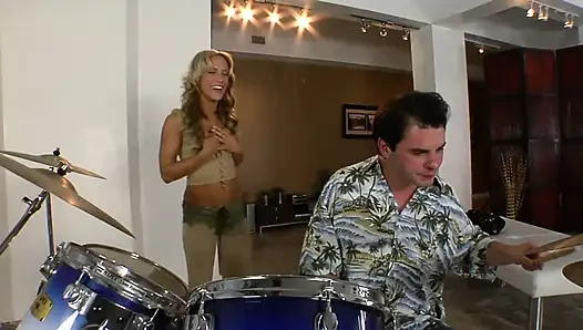 Amazing blonde sucks the cock of a young drummer