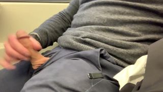 Jerking off my hard cock in public and cumming on the train