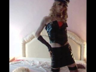 Sissy CD poses in latex and black hat