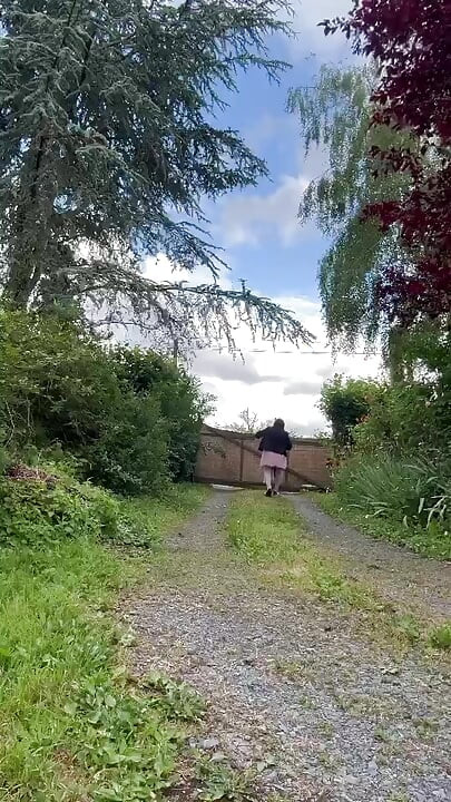 Dressed in a pink polka dot skirt for a party