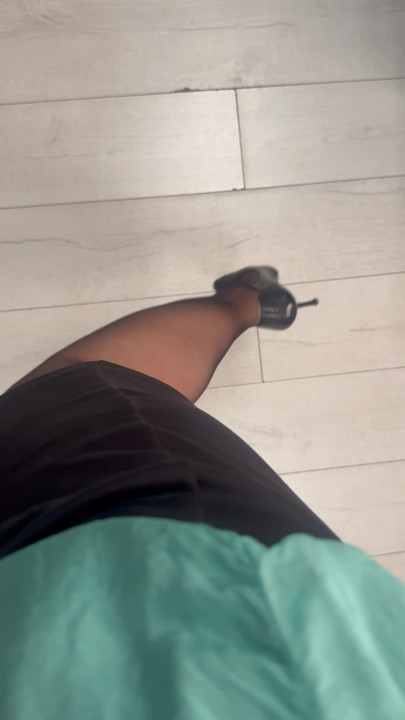 Wife teasing in nylons, high heels and short skirt