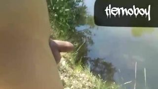 Naked Twink In The River Is Pissing And Cumming