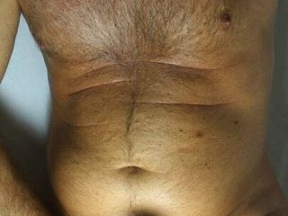 Showing my hairy chest and hard cock