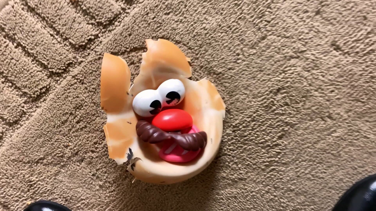 Destroying M. Potato Head & spitting on him!