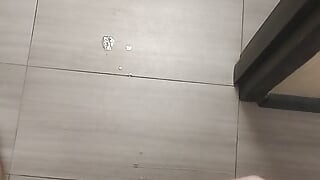 Jerking and cumming in public bathroom hallway