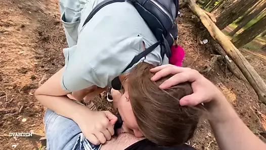 Amateur brunette gives sensual blowjob in the forest