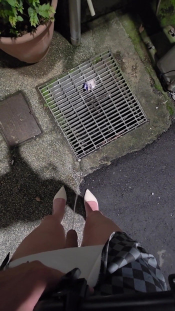 Key moment from "Shemale Ting xuan walks outside to pee, then masturbates and cums on her thigh."